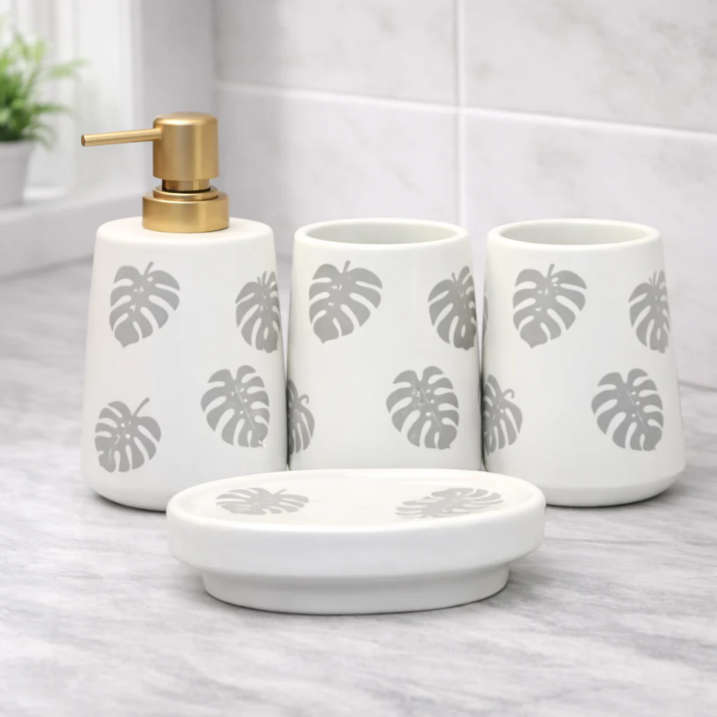 4-Piece Bathroom Accessories Set – White with Grey Leaf Design Soap Dispenser, Toothbrush Holder & Soap Dish